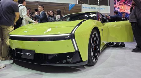 108195426-1757328127105-Xpeng_CEO_with_Car.jpg