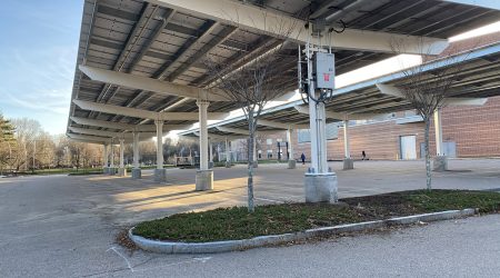 2048px-NNHS_Walnut_St_solar_canopy_close.agr-1200x900-1.jpg