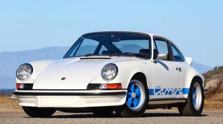 Classic-whit-Porsche-Carrera-parked-on-gravel-2.jpg
