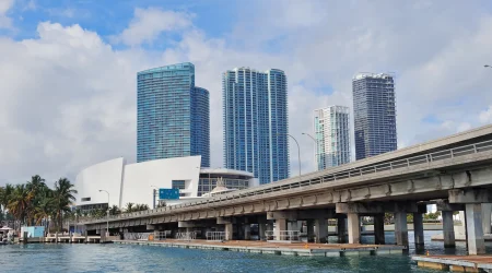 miami-skyscrapers-with-bridge-sea-day-scaled.webp