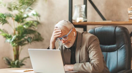 person-regretful-in-front-of-a-computer.jpg