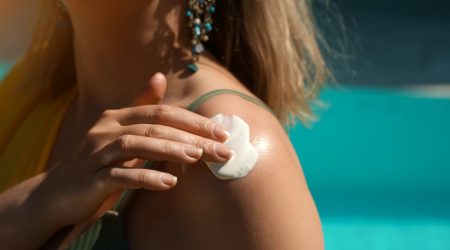 woman-outside-applying-sunscreen-to-shoulder-creamy-foam-concept-adobestock-636248390.e1dspe3njm.jpg